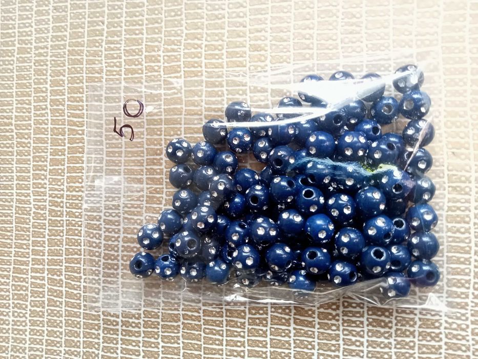 50 contas redondas em acrílico 7mm