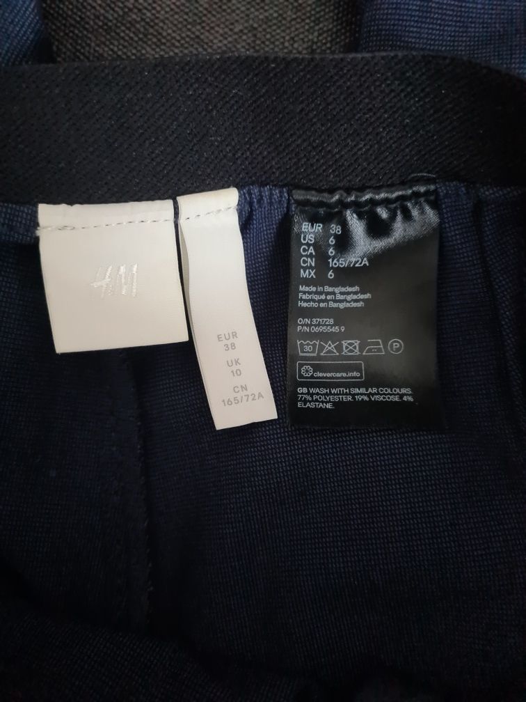 Eleganckie spodnie marki H&M. Rozmiar 38.
