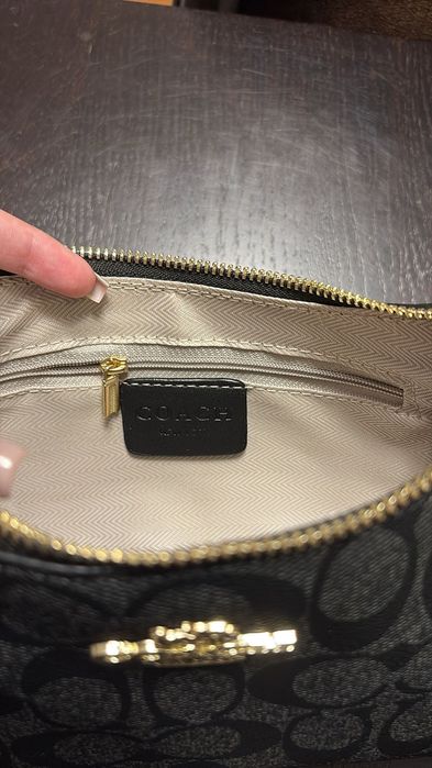Mala Coach com duas alças e saco