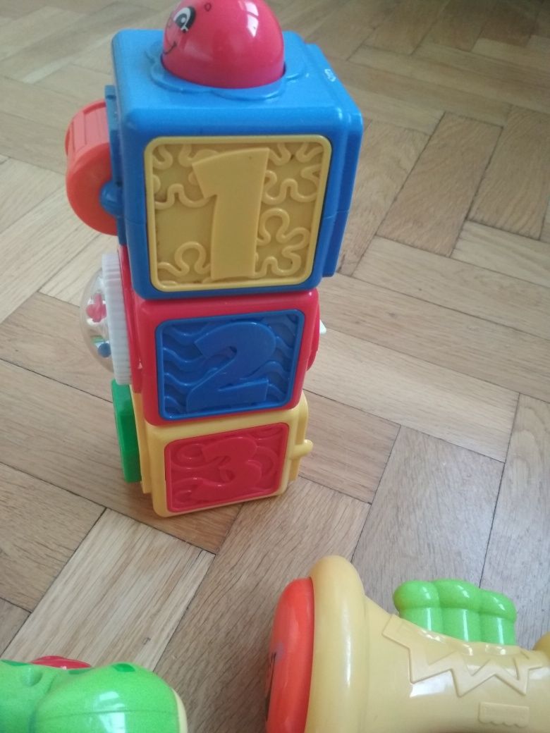Zabawki Fisher Price pchacz krokodyl,grające pianinko, trąbka i klock
