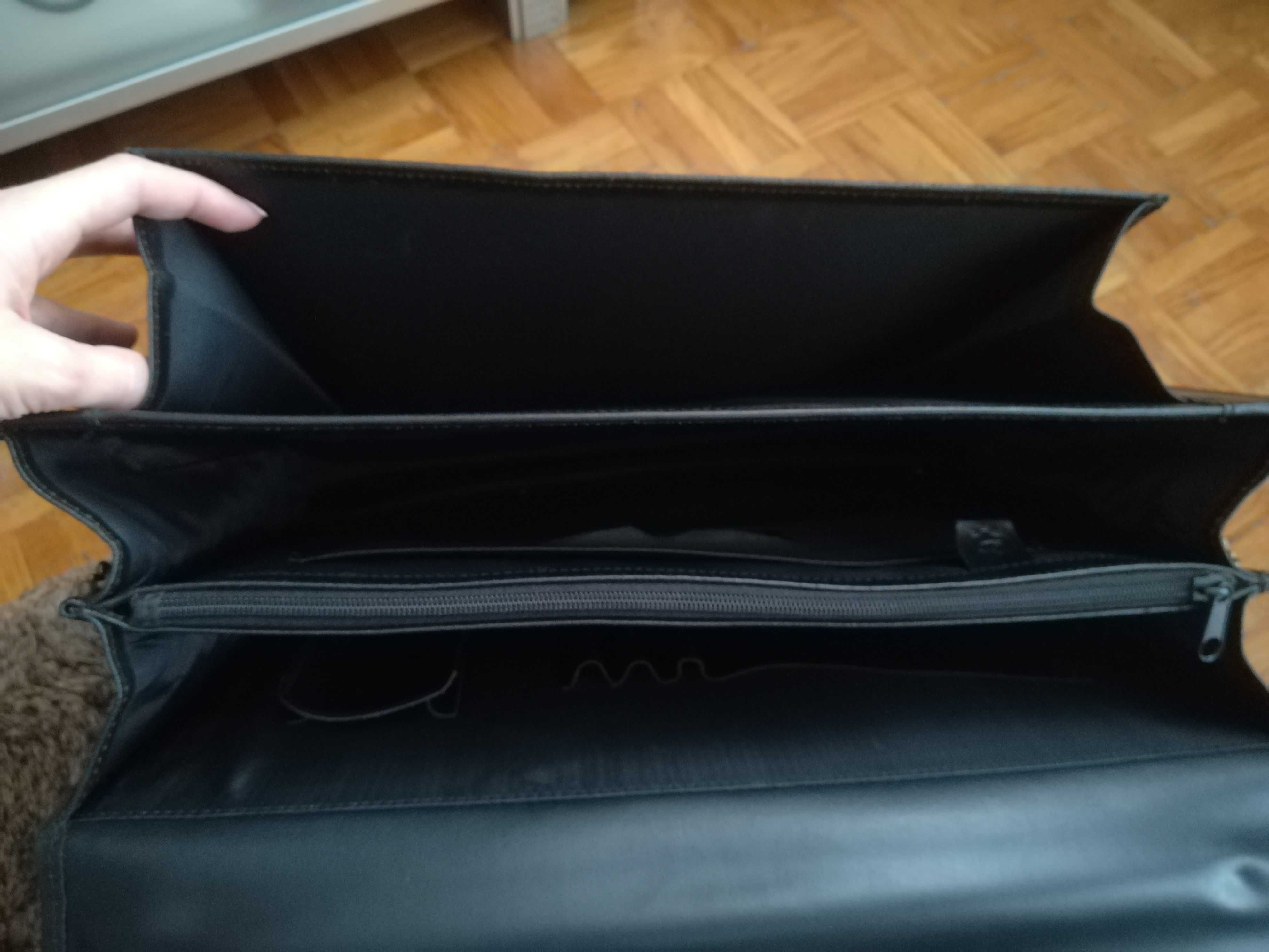 Skórzany męski neseser do pracy.