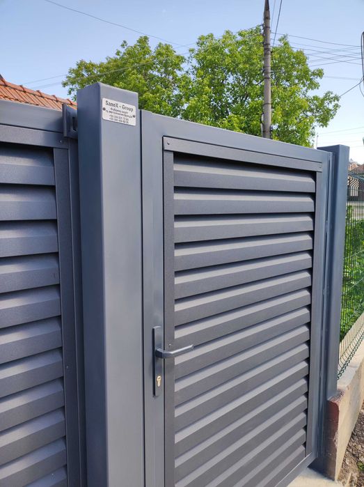 ... SaneX - Group ... Фабрика воріт та металоконструкцій