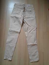 Krótsze beżowe bawełniane spodnie Zara r.34