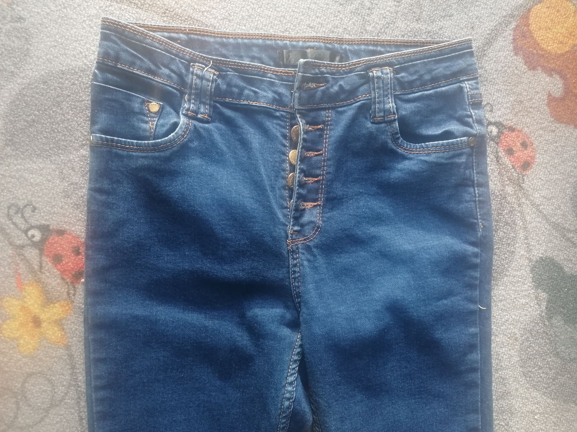 Spodnie jeansowe r. 10
