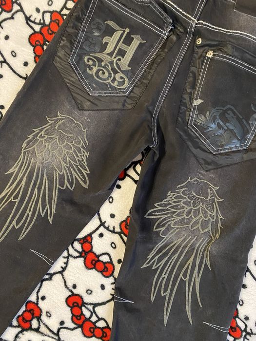 джинсы бегги с крыльями