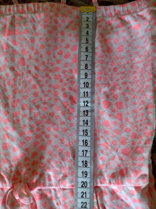 Неоново-рожевий дитячий комбінезон H&M із сердечками