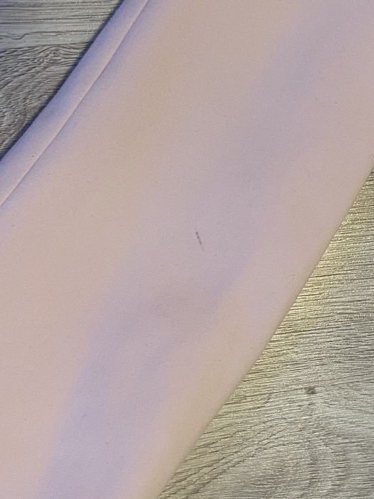 Pudrowo-różowy płaszcz z kieszeniami Reserved