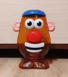 Pojemnik na zabawkę ziemniak, bulwa Toy Story. Można doczepiać elem.