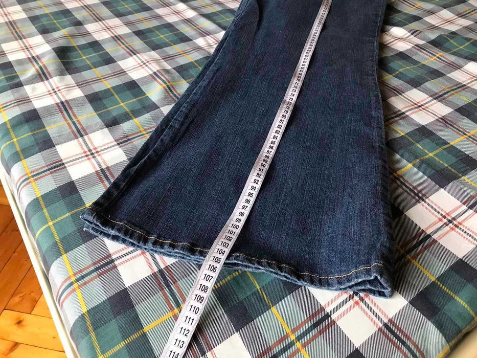 Новые джинсы широкие к низу клеш  Run&Fly размер 54-56.