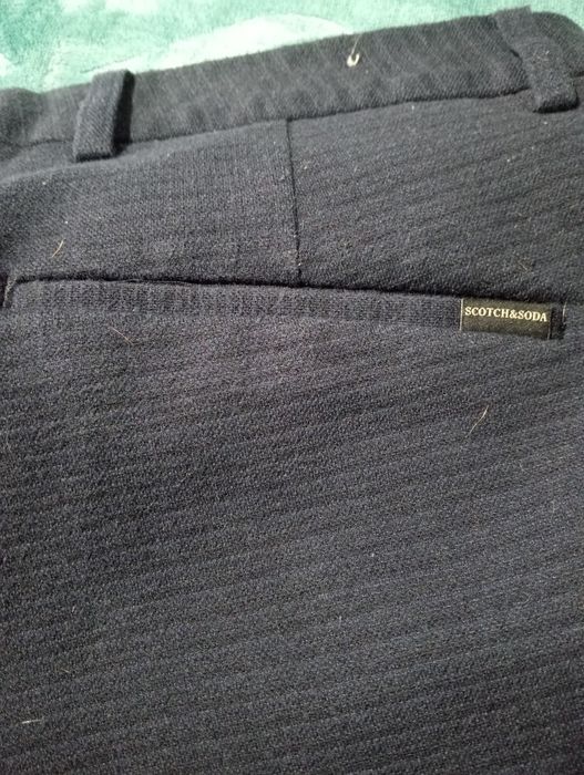 Calças azuis escuras