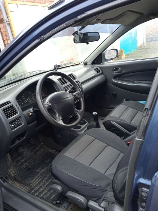 Продам Мазда 323