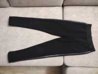 Spodnie ocieplane, getry r.122-128, ozdobne paski wzdłuż nogawek