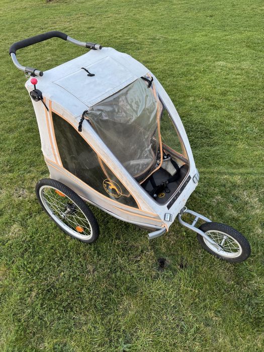 Przyczepka Blue Bird 2w1 - koło joggingowe i zaczep do roweru