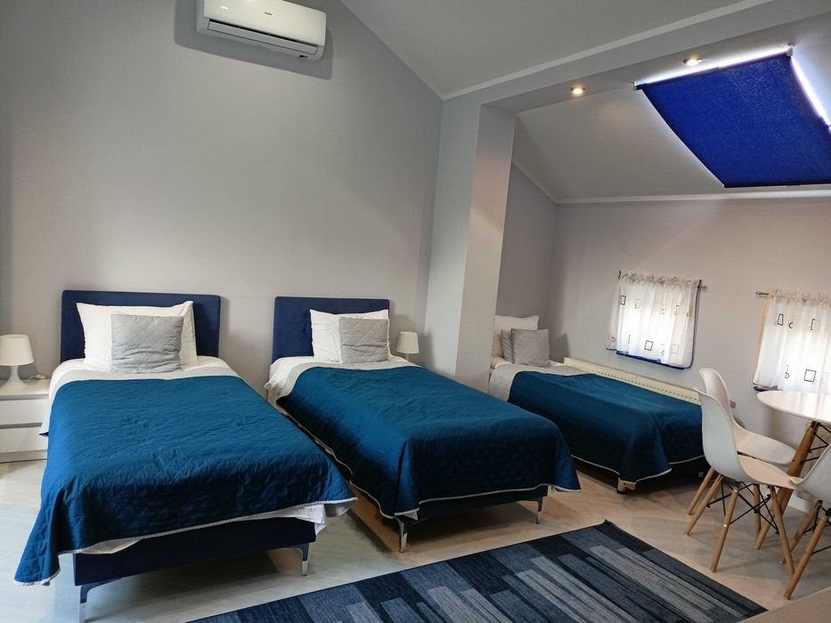 Pokoje z łazienkami,klima,Netflix, aneksy kuch.