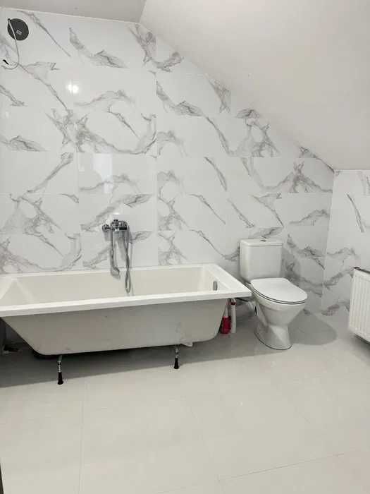 просторий будинок 228 м² з цокольним поверхом та  ділянкою 23 сотки