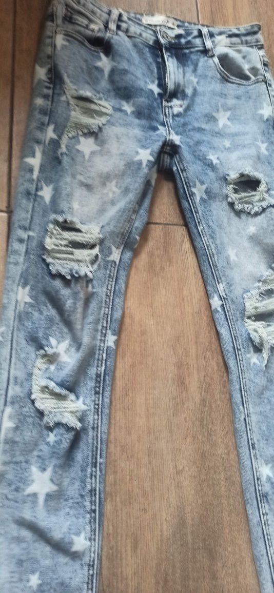 Jeansy damskie gwiazdy dziury hit denim life L