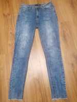 Spodnie jeans rurki 38
