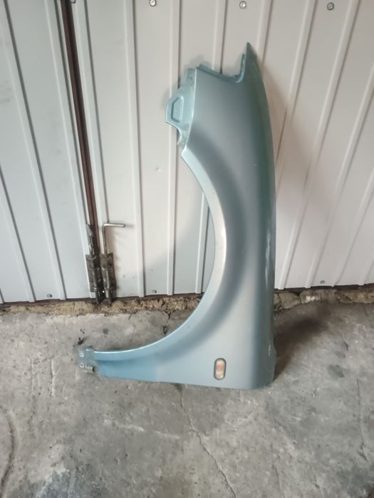 Błotnik przedni lewy ładny Passat B5 LB6N