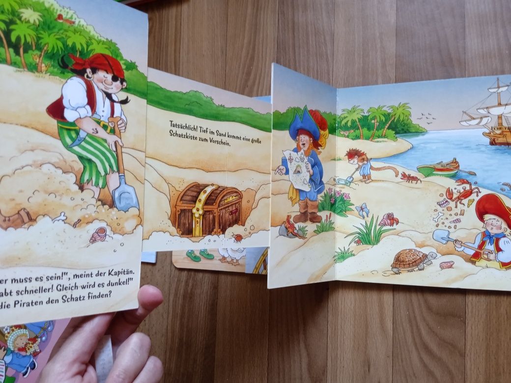 Немецкий язык. Книга про пиратов на немецком языке с выдвижными окош