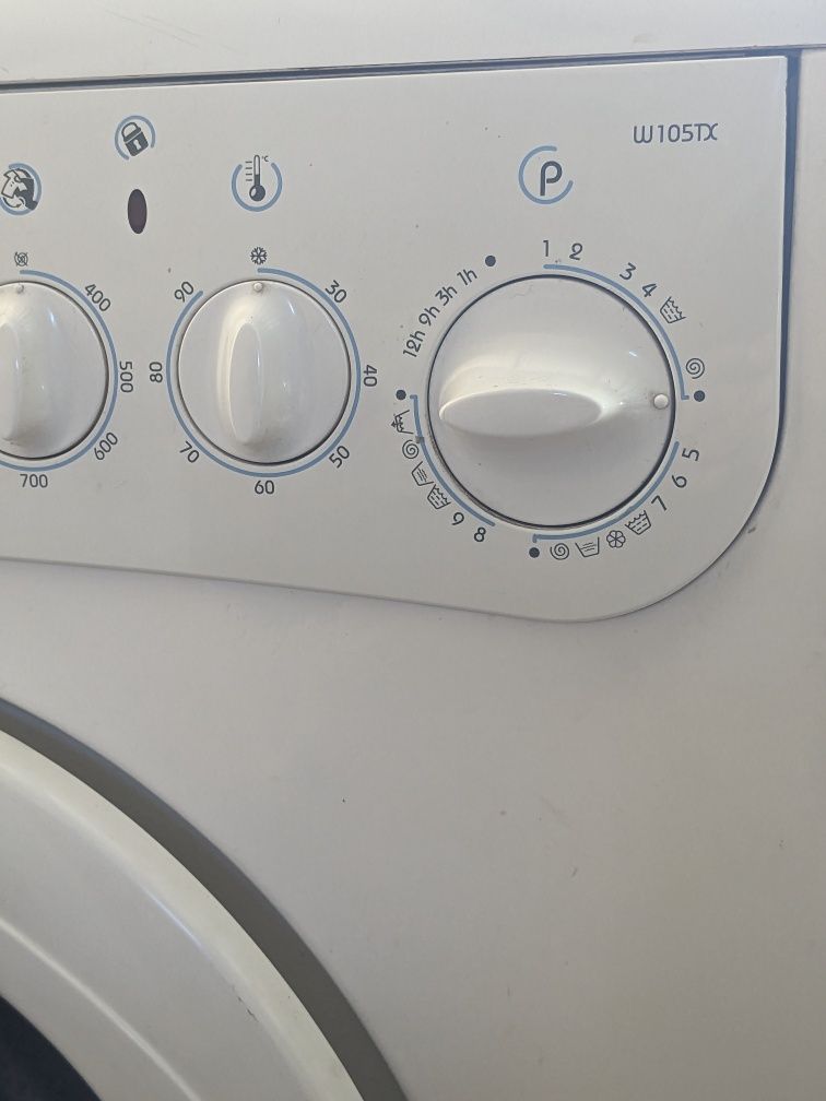 Indesit.  w105 - TX