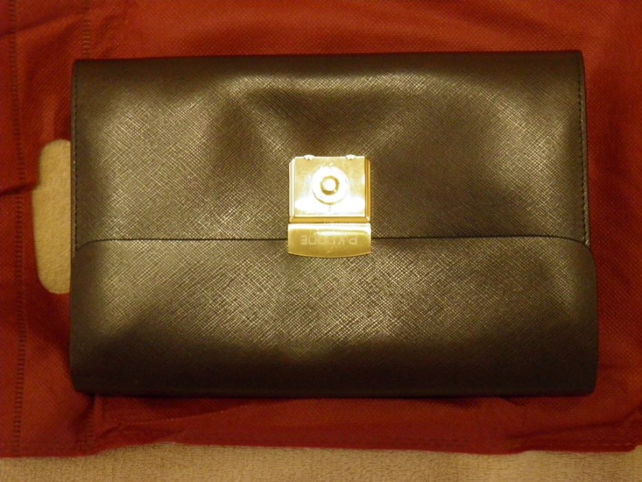 Барсетка - P.KUONE из воловьей кожи.