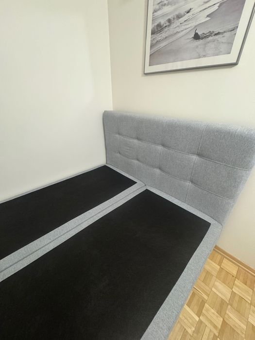 Łóżko z zagłówkiem szare stan idealny