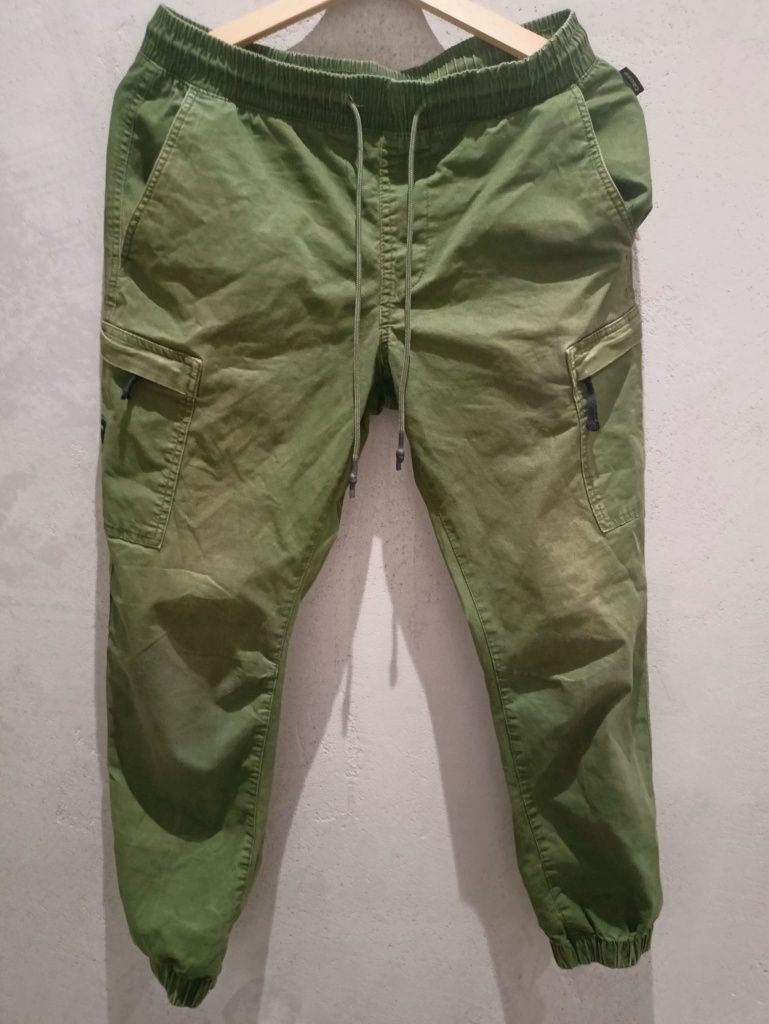 Zielone spodnie Cropp Roz.S