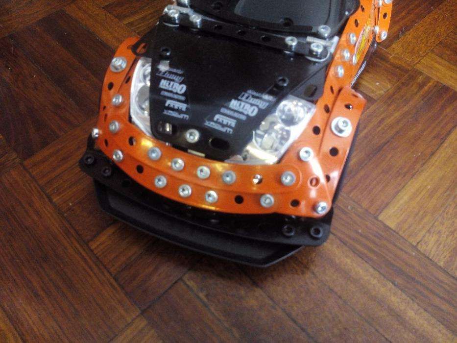 Carro telecomandado da Meccano com sistema de som e luzes como novo