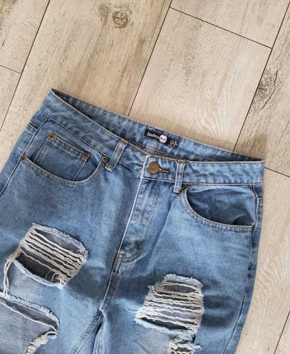 Spodnie z wysokim stanem spodnie z przetarciami 38