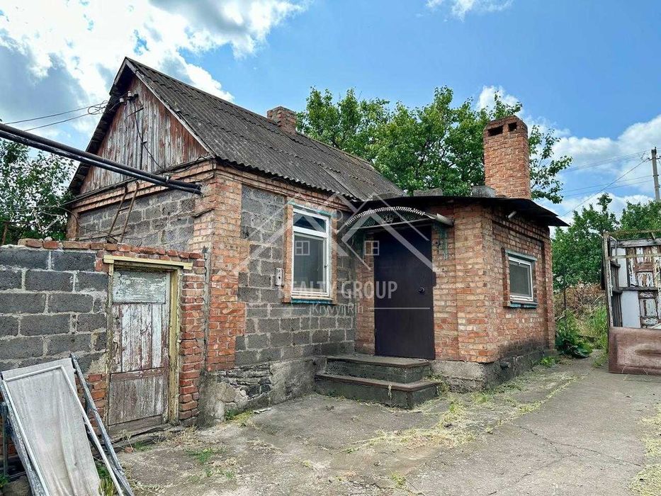 Продаж будинку з гаражем в Металургійному районі