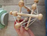 Manhattan Toy elastyczna bryła z kulkami Montessori