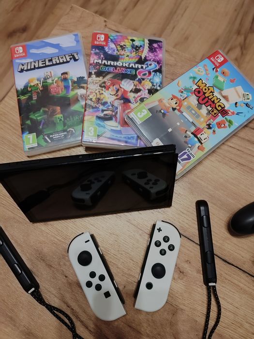Nintendo switch OLED zestaw plus 3 gry