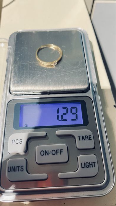 Anel de ouro 18k com 1 diamante