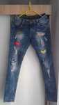 Spodnie jeansy z naszywkami Rozm 38 M