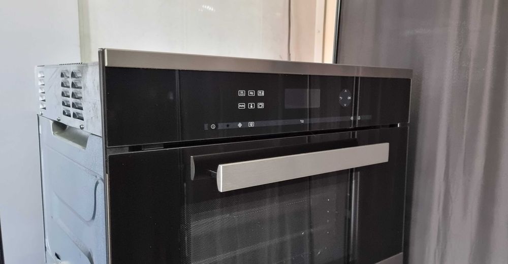 Urządzenie do gotowania na parze z kuchnią mikrofalową Miele DGM 6401