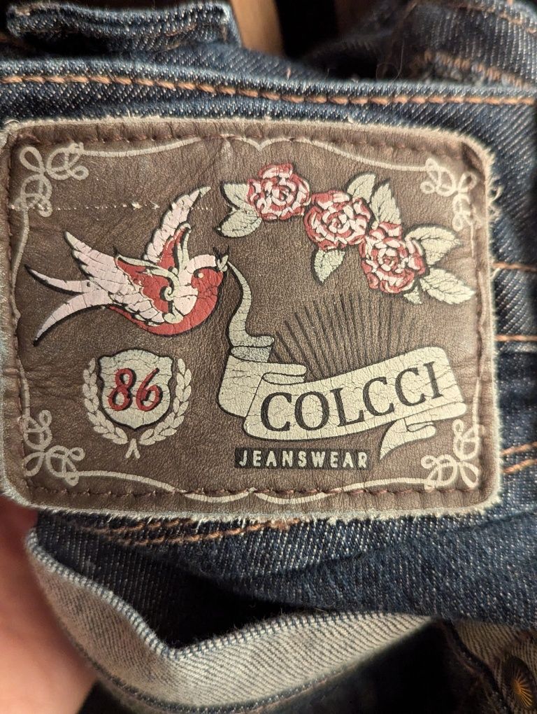 Jeansowe spodnie na szelkach Colcci r. 36