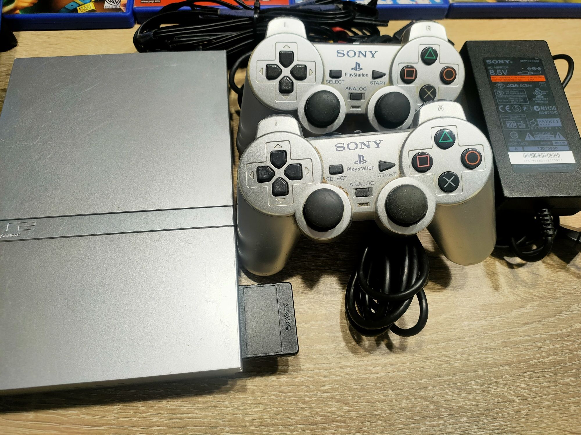 Konsola PlayStation 2 Sony z grami + słuchawki gamingowe