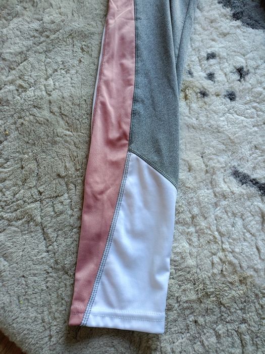 Nowe z metką Legginsy damskie sportowe długie w paski r. S/m