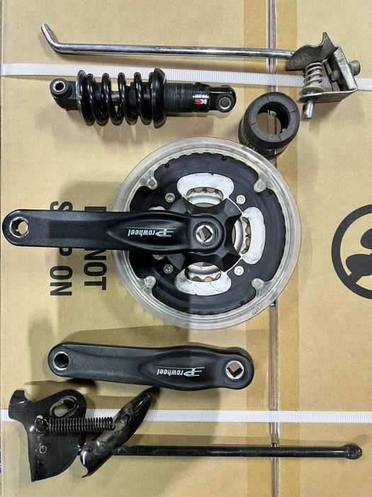 Амортизатор велосипедний, задній та інше