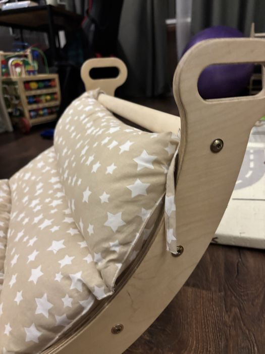 Балансувальна деревʼяна гойдалка