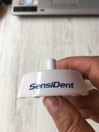 Зарядка для зубной щетки фирма Sensi Dent.