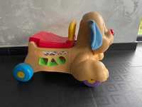 piesek fisher price jeździk