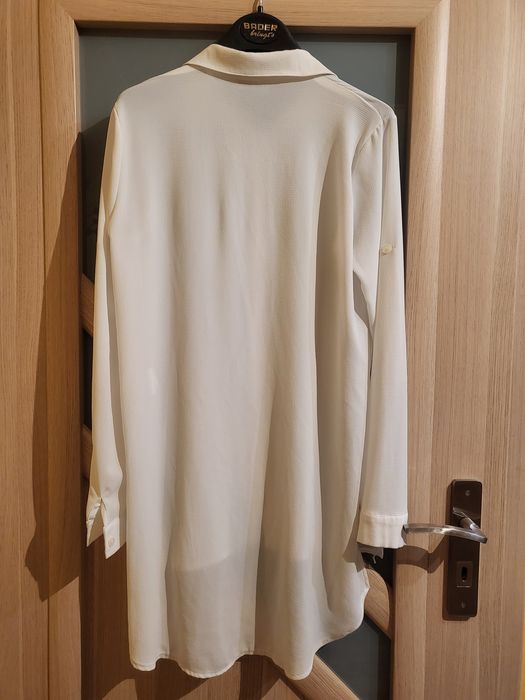 Biała koszula asymetryczna