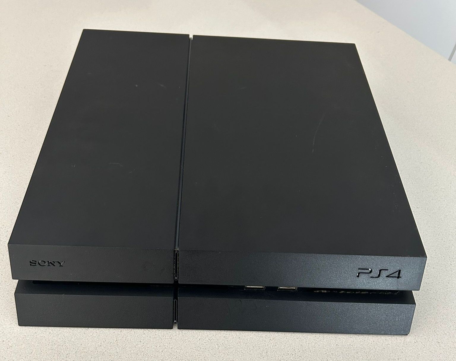 PS4 Slim 1TB + comando + 2 jogos + suporte