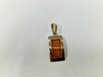 Złoty wisiorek damski/ 585/ 2.03 gram/ Bursztyn