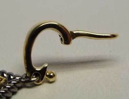 Srebrny dwukolorowy wisior ciekawy wzór