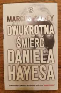 Dwukrotna śmierć Daniela Hayesa, Marcus Sakey