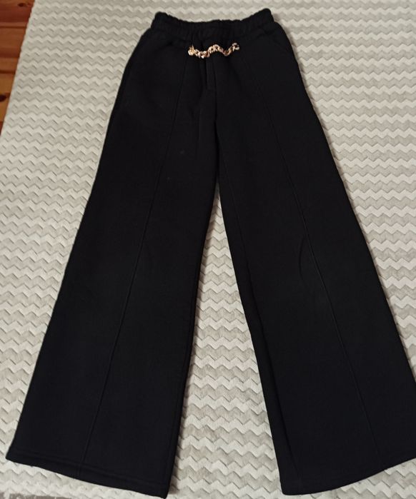 Теплі штани палаццо на флісі,в ідеальному стані.