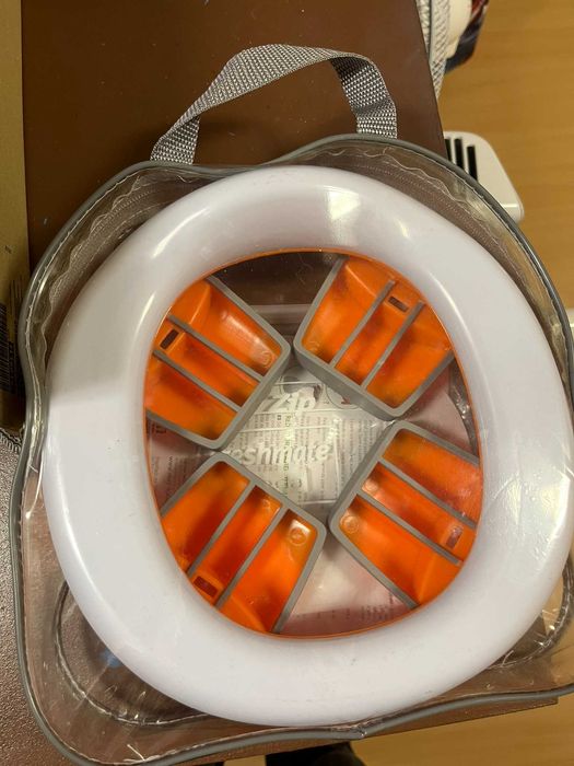 Redutor de wc de viagem