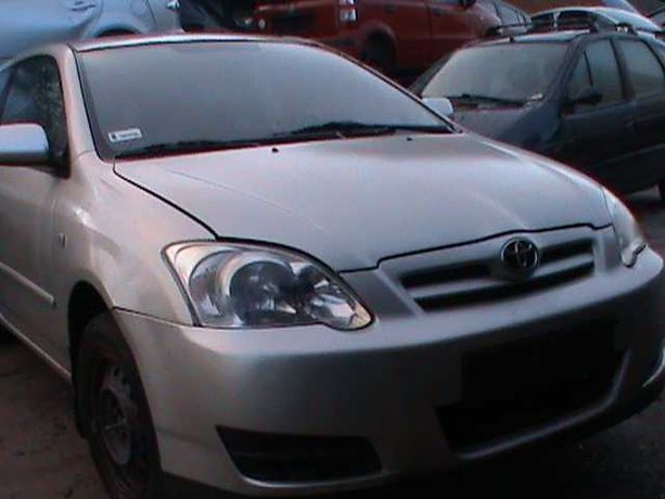 Toyota Corolla Lampy zderzak maska błotniki klapa drzwi